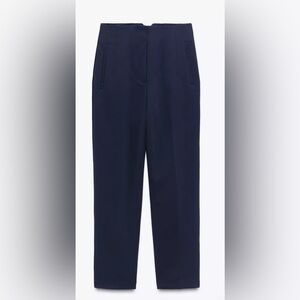 Brand new navy blue Zara high-waisted pleated trousers.